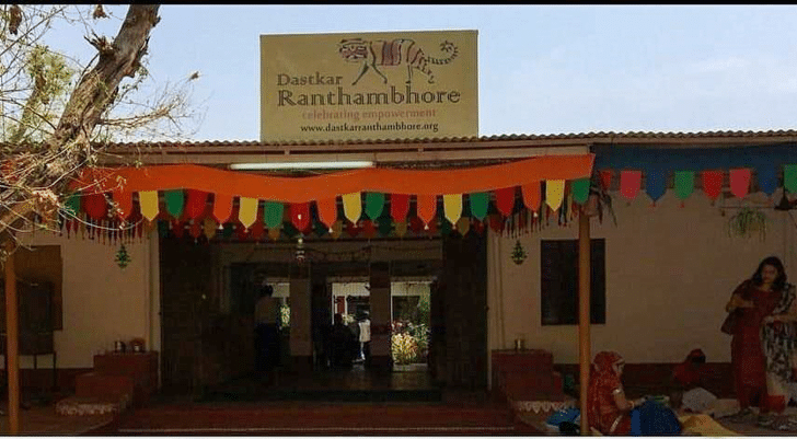 Entrance view of Dastkar Ranthambore, adorned with colorful decorations - Dastkar Ranthambore