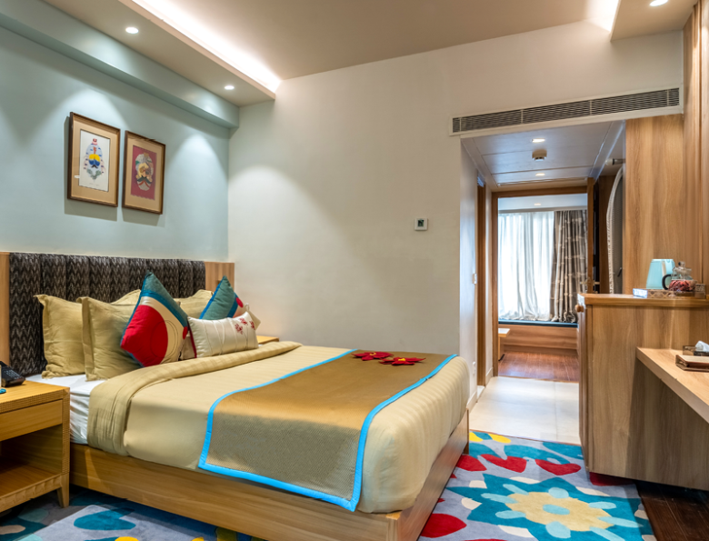 Stylish Deluxe Room with cosy interiors at Bookmark Resorts, Manali